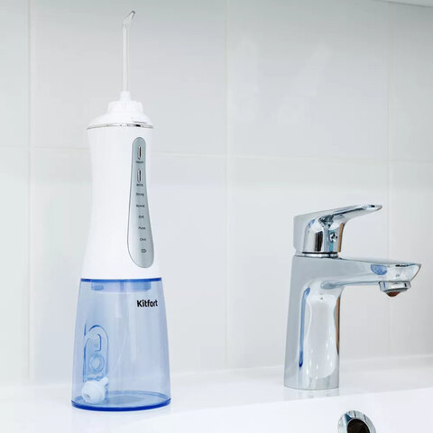 Ирригатор для полости рта KITFORT КТ-2915, портативный, емкость резервуара 0.35 л, 2 насадки, белый